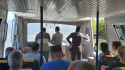 Barca per l'isolotto di Nissi